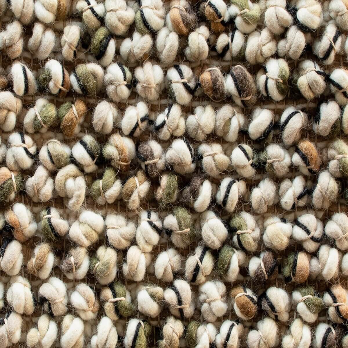 Alfombra Marble de Brink & Campman en diseño empedrado, tejida a mano en pura lana virgen.