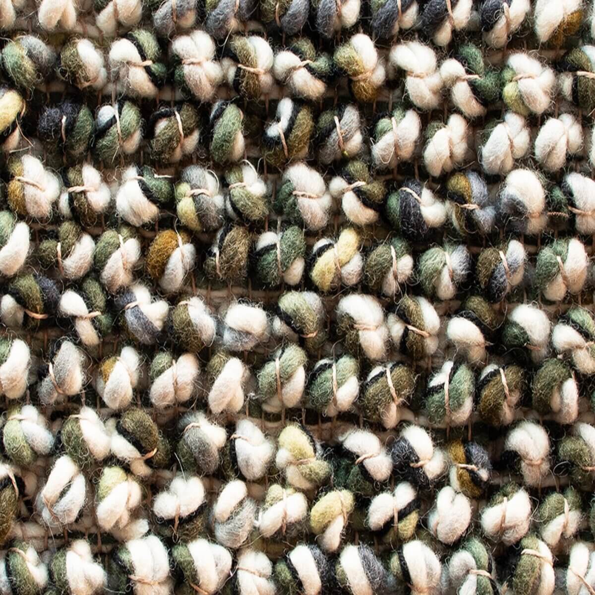 Alfombra Marble de Brink & Campman en diseño empedrado, tejida a mano en pura lana virgen.