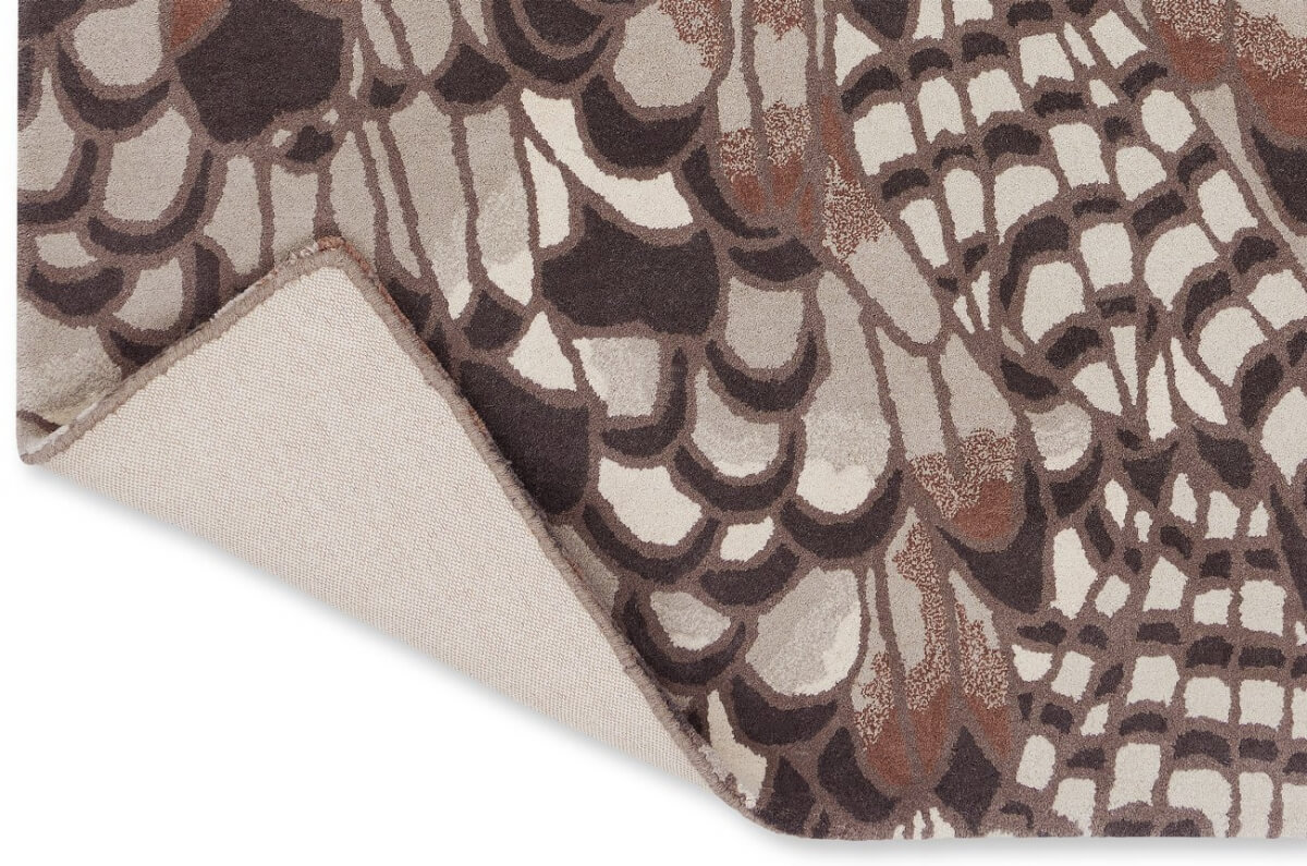 Alfombra de lana con diseño de plumas en tienda de alfombras Decorazone