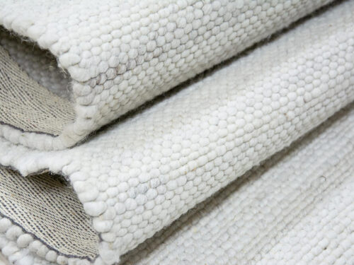 Alfombra Fils blanco con diseño jaspeado en Decorazone tienda de alfombras