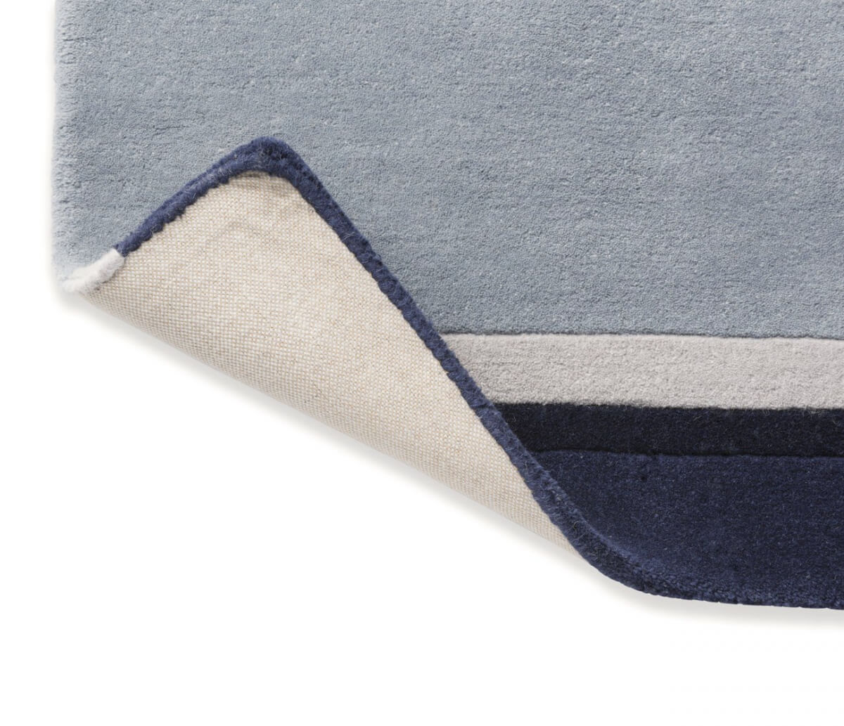 Alfombra Laura Ashley Eato, diseño lineal contemporáneo, fabricada a mano en lana pura.